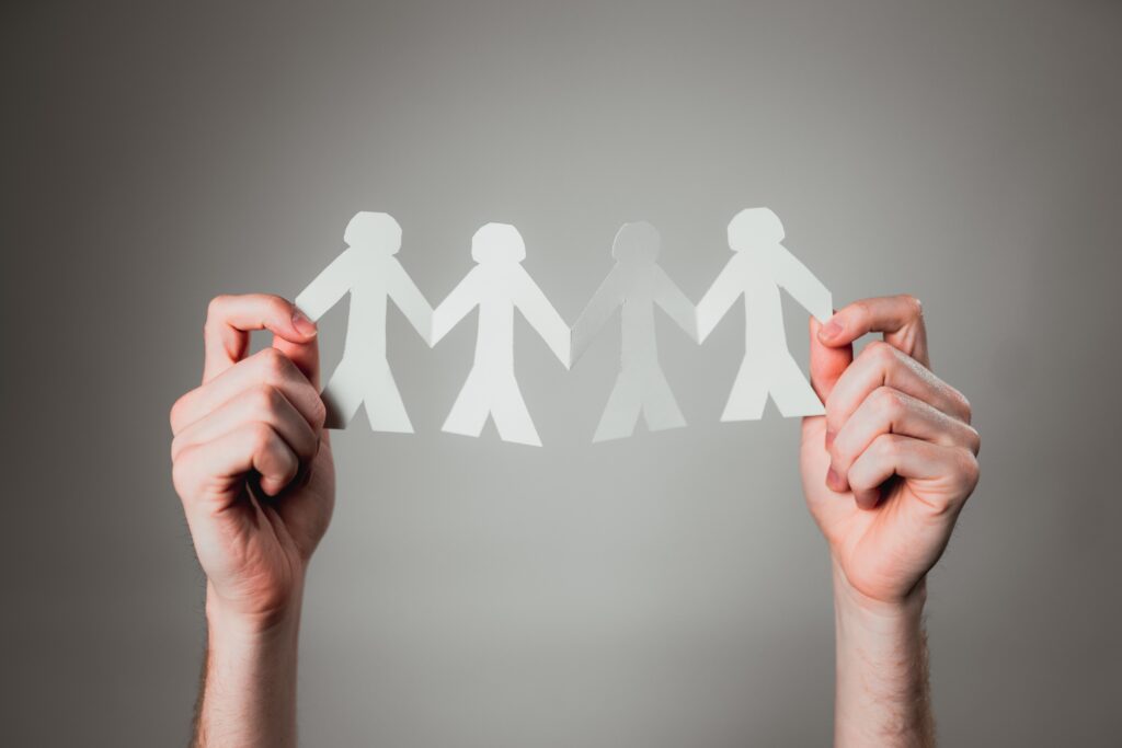 How responsibility attributions to self and others relate to outcome ownership in a social context