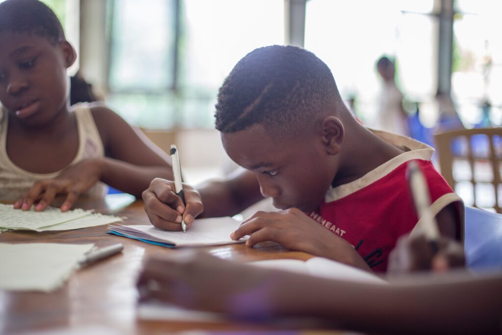 Child learning about antibiotics in Africa