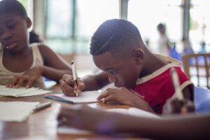Child learning about antibiotics in Africa